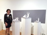 Leora Brecher with some of her sculptures at MUSE Gallery.