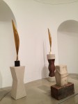The two tall works are Brancusi's Bird sculptures.