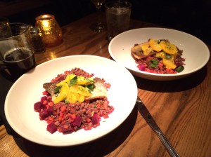 Bottom plate: Arctic char with warm lentil salad and orange slices. Top plate: Ditto.